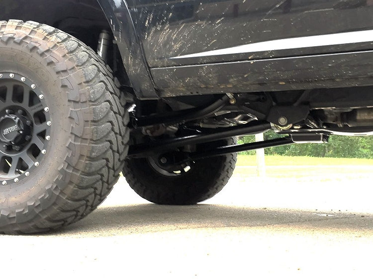 More ground and tire clearance than stock radius arms